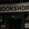 a store front with a sign