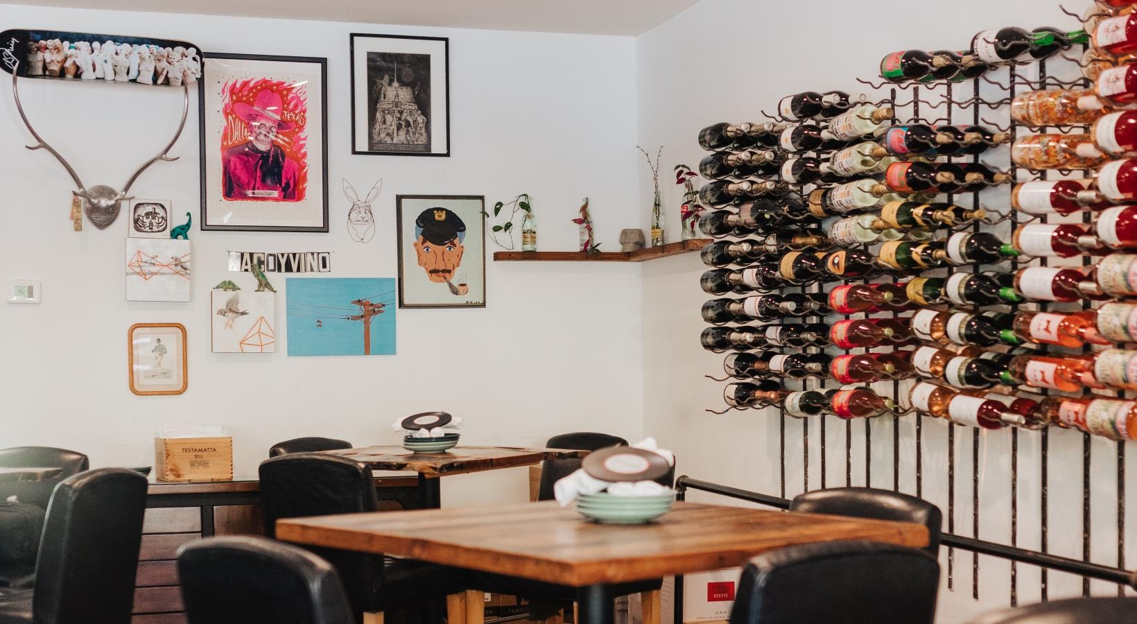 A beautiful community at the heart of all your passions a room with a table chairs and a wall with pictures on it